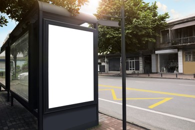 Photo of Blank advertisement board on public transport stop