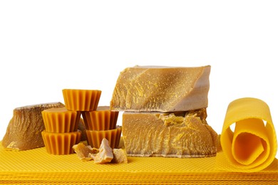 Photo of Different natural beeswax blocks and sheets on white background
