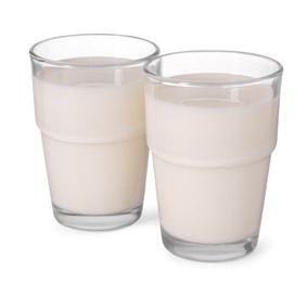 Photo of Glasses of fresh milk isolated on white