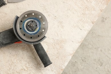 Photo of Circular saw on table. Prepared for renovation, top view with space for text