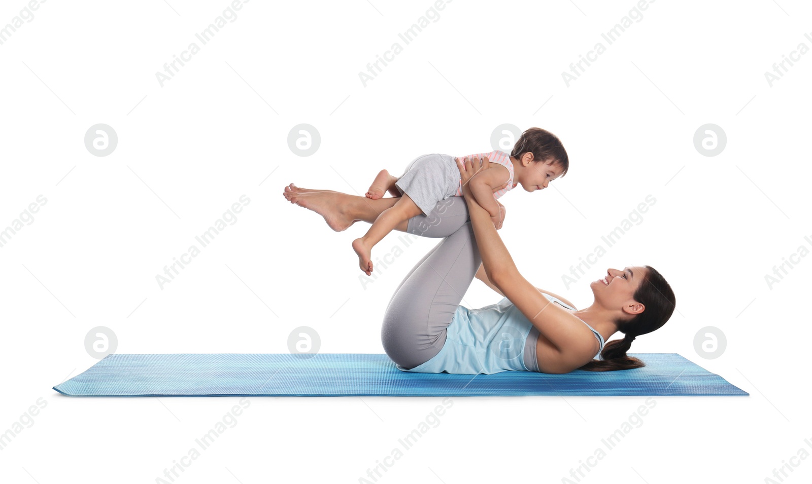 Photo of Young woman doing exercise with her son isolated on white. Time for fitness