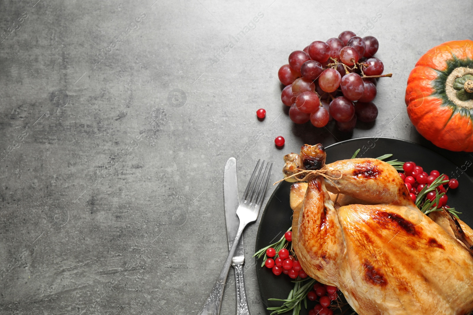 Photo of Flat lay composition with turkey on grey background, space for text. Happy Thanksgiving day