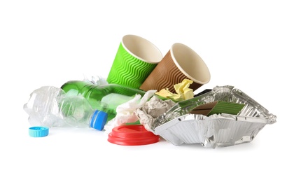 Pile of different garbage on white background. Trash recycling