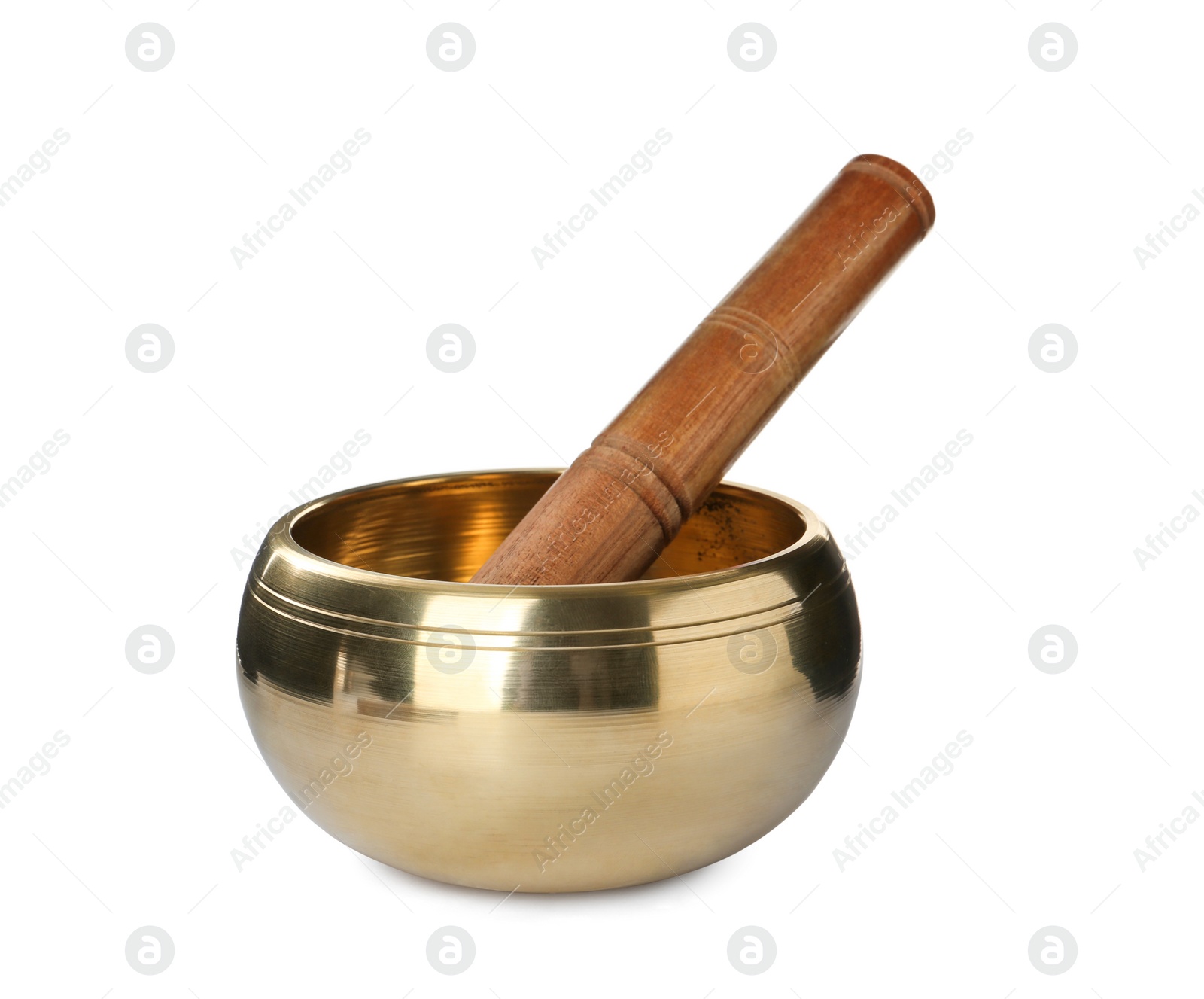 Photo of Tibetan singing bowl with wooden mallet isolated on white