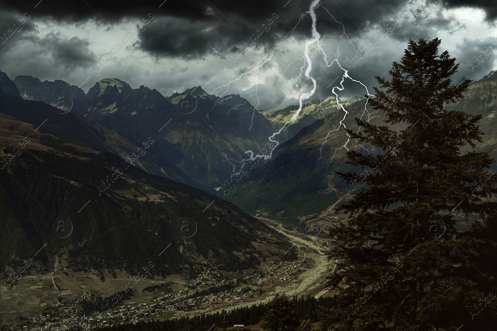 Image of Dark cloudy sky with lightnings over beautiful mountains. Thunderstorm