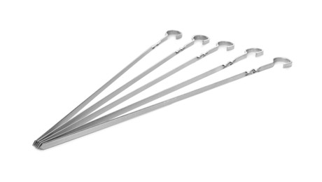 Photo of Metal skewers on white background. Barbecue utensil