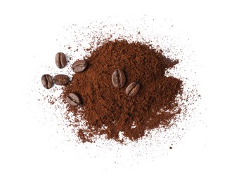 Photo of Heap of ground coffee and beans on white background, top view