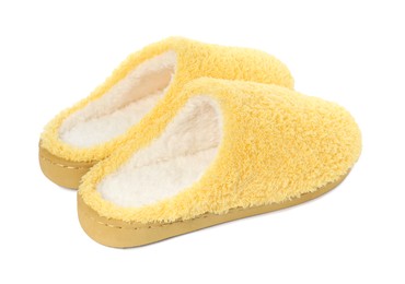 Photo of Pair of yellow soft slippers isolated on white