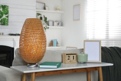 Console table with stylish decor in living room