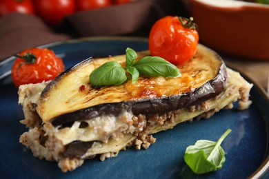 Photo of Blue plate of delicious eggplant lasagna, closeup