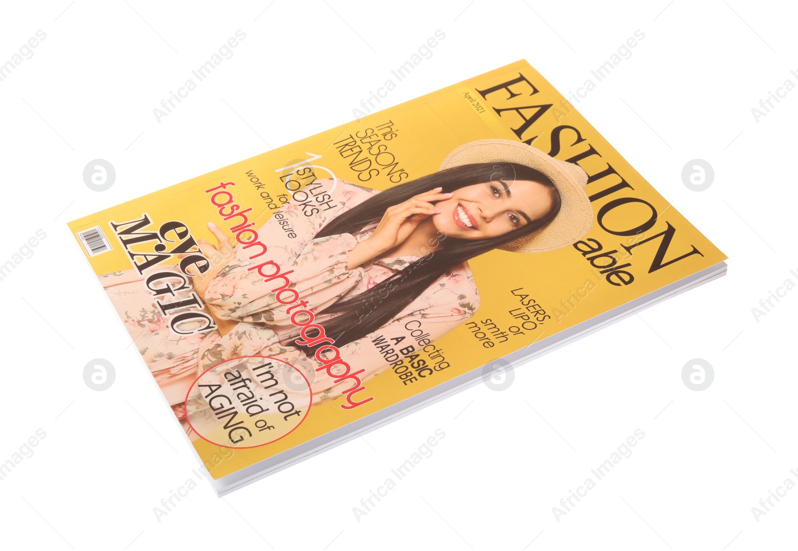 Photo of Modern printed fashion magazine isolated on white