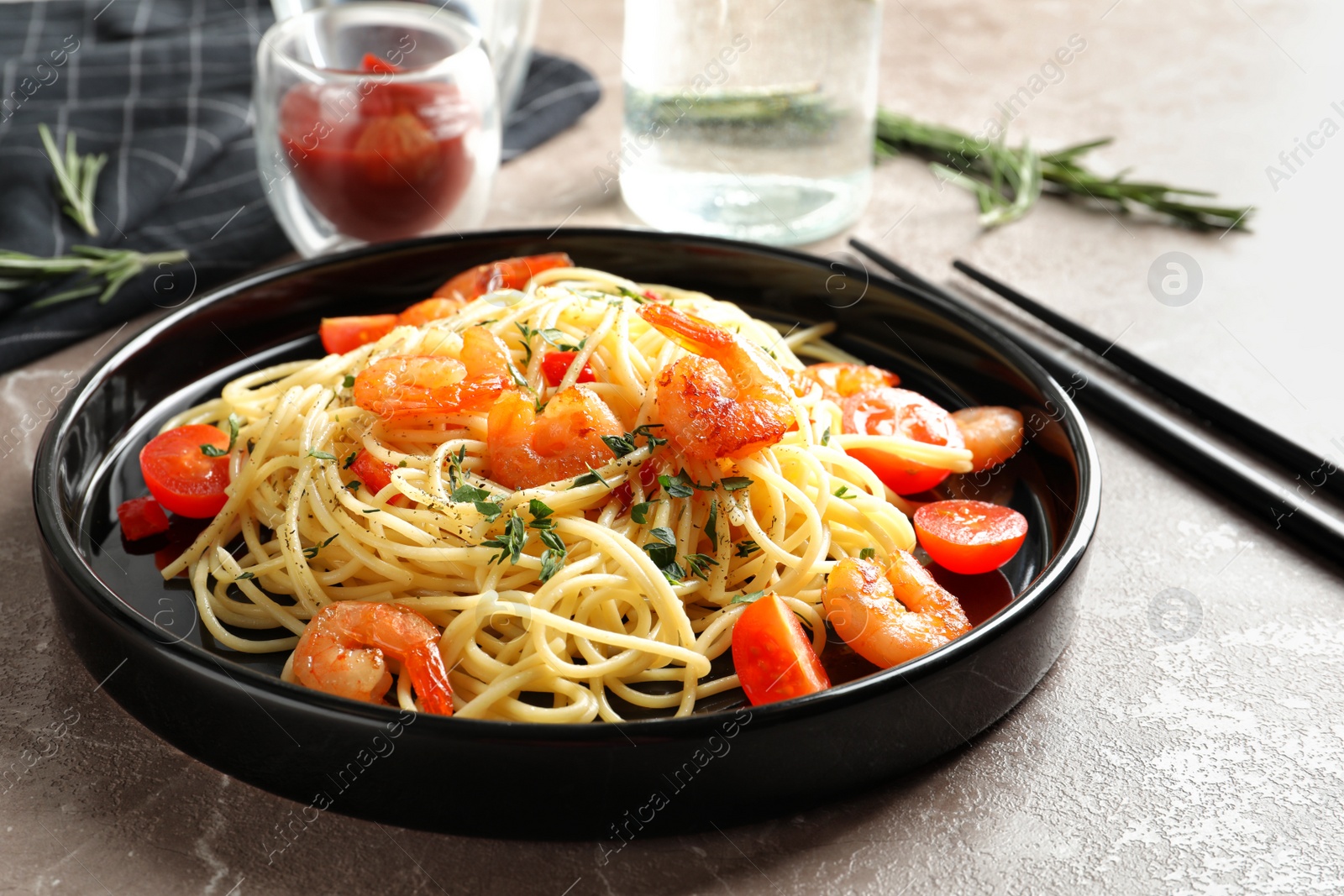 Photo of Delicious pasta with shrimps on plate