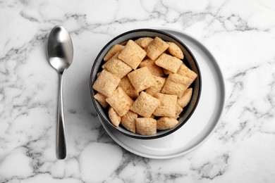 Photo of Delicious corn pads served on white marble table, flat lay