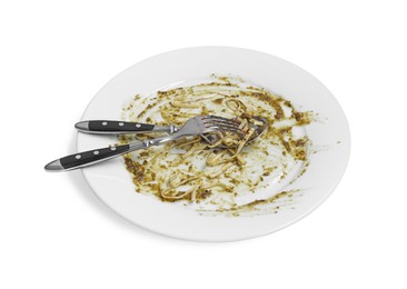 Photo of Dirty plate and cutlery on white background