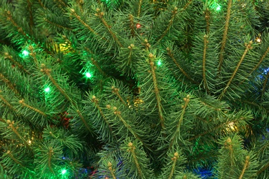 Glowing bright fairy lights on Christmas tree