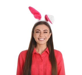 Photo of Portrait of beautiful woman in Easter bunny ears headband on white background