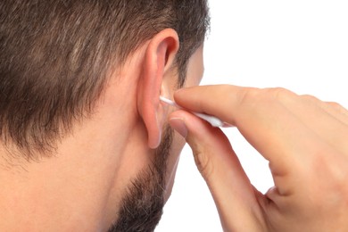 Photo of Man cleaning ears on white background, closeup