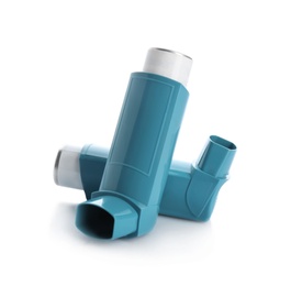 Photo of Two portable asthma inhalers on white background