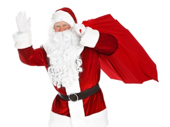 Photo of Authentic Santa Claus with bag full of gifts on white background