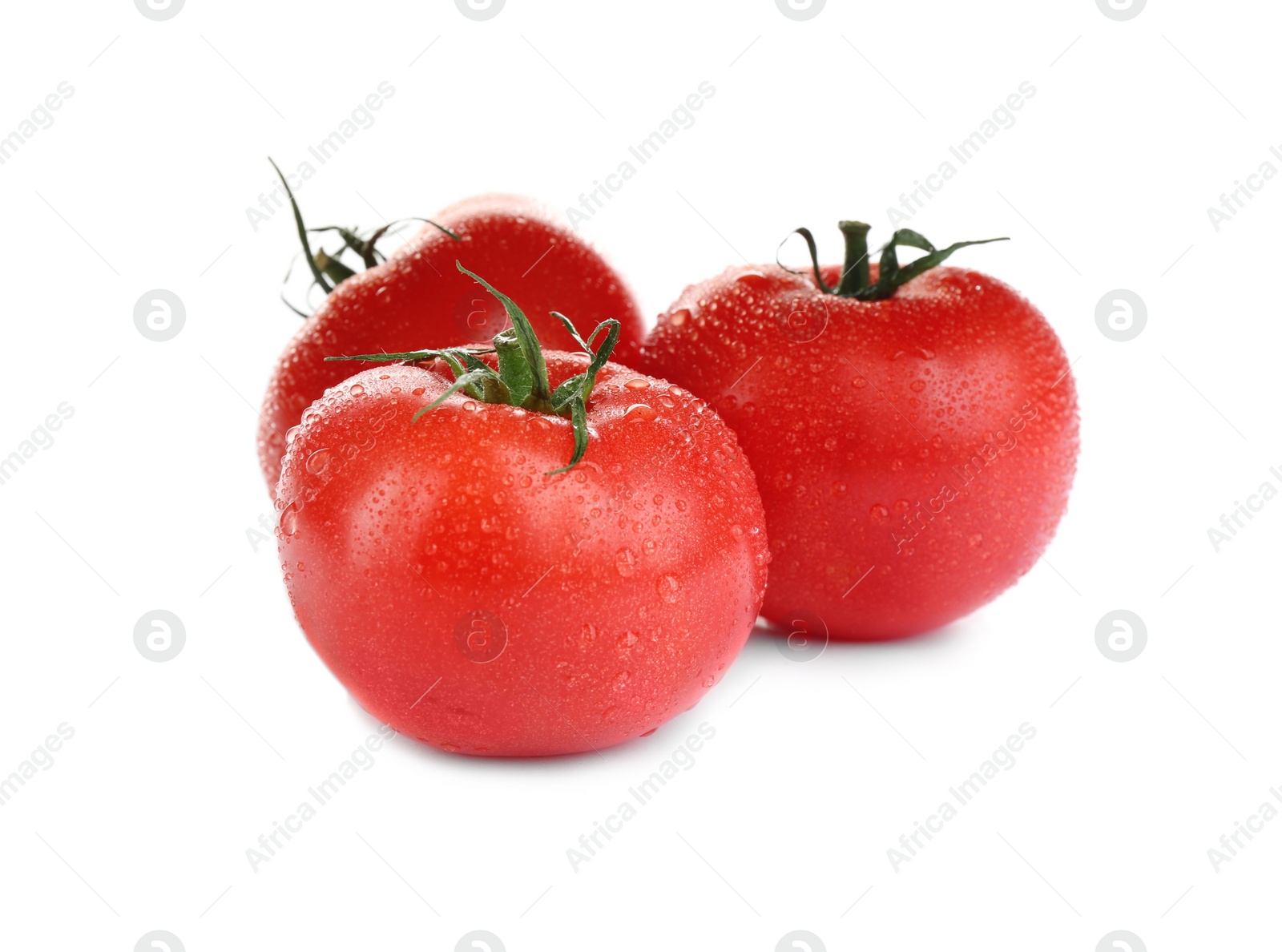 Photo of Fresh ripe organic tomatoes with water drops isolated on white