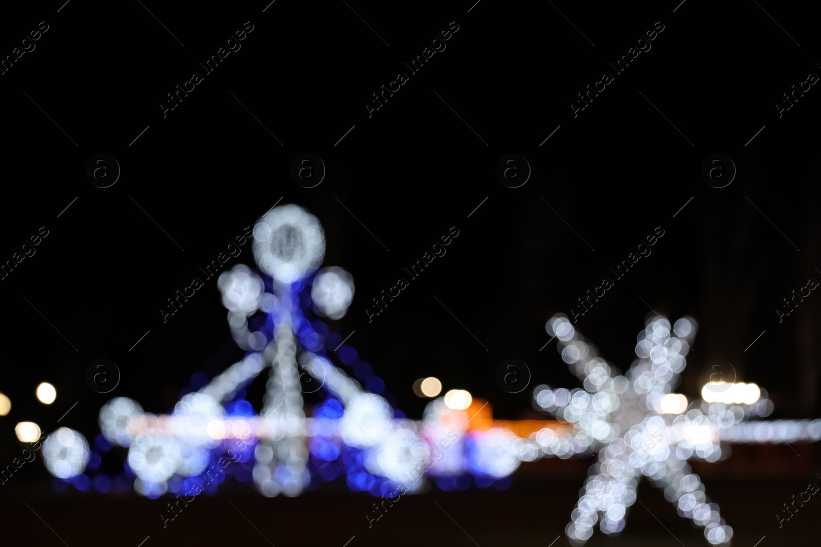 Photo of Beautiful street lights at night. Bokeh effect