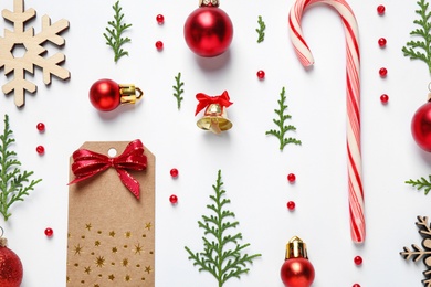 Flat lay composition with Christmas decor on white background