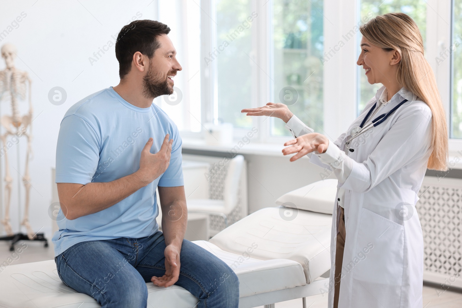 Photo of Professional doctor working with patient in hospital