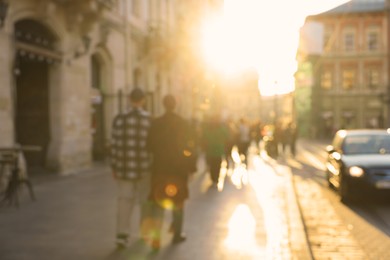 Blurred view of people walking on city street