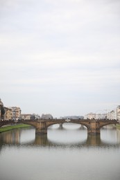 Picturesque view of city with bridge and river