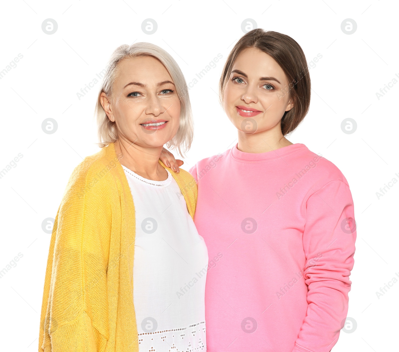 Photo of Portrait of mature woman and her daughter isolated on white