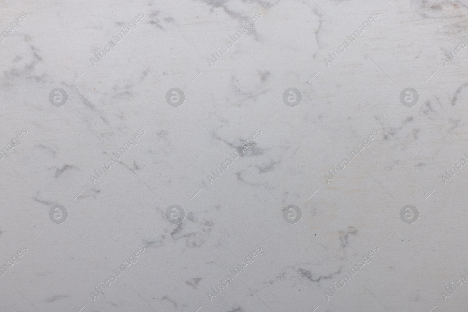 Photo of White marble surface as background, closeup view