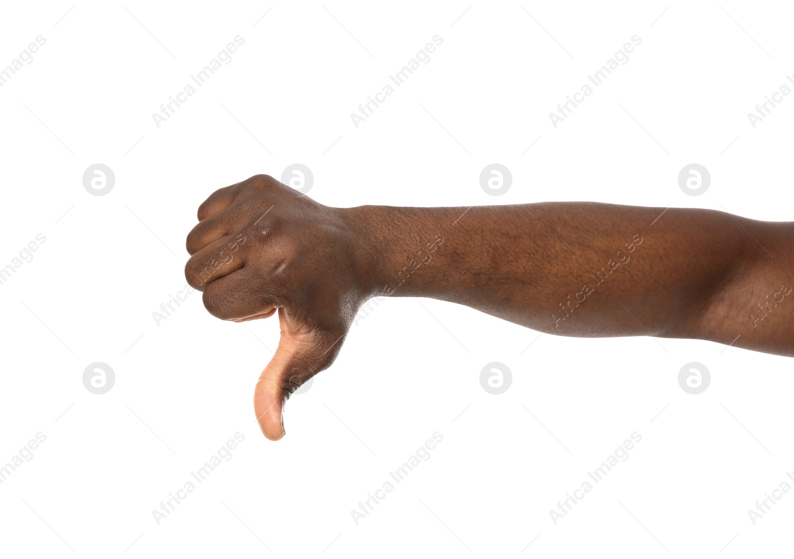 Photo of African-American man showing thumb down gesture on white background, closeup