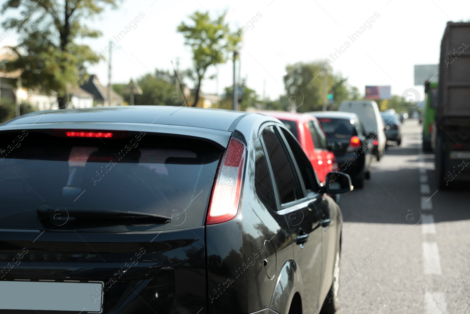 Photo of Cars in traffic jam on city street