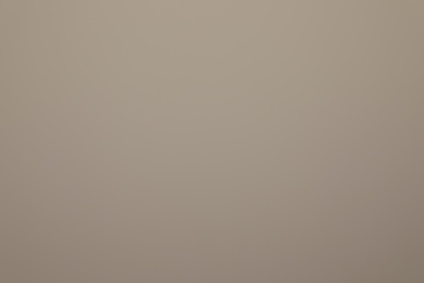 Photo of Texture of grey wall as background. Simple design