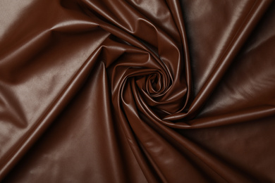 Photo of Piece of crumpled leather as background, top view
