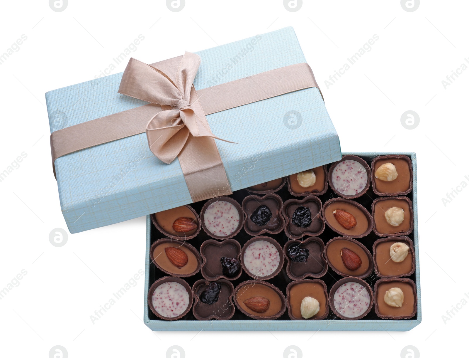 Photo of Box of delicious chocolate candies isolated on white, top view