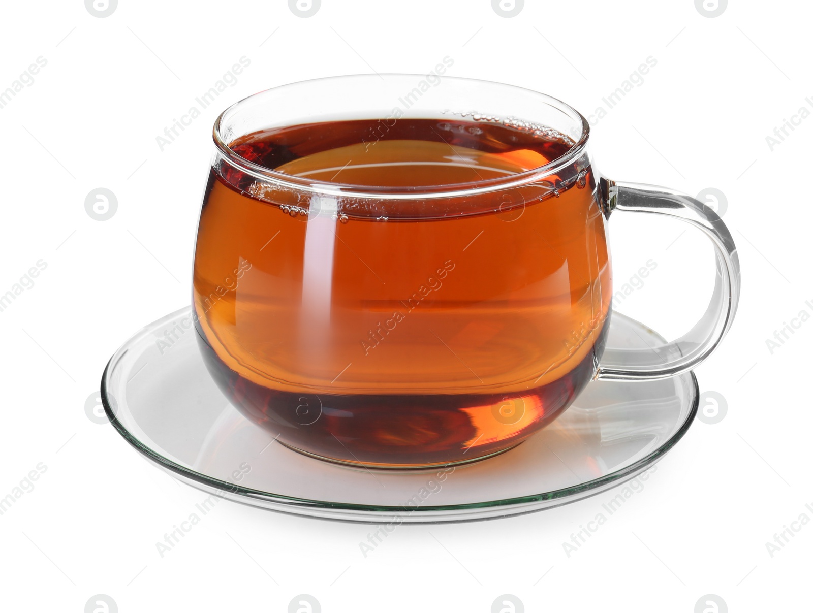 Photo of Aromatic tea in glass cup isolated on white