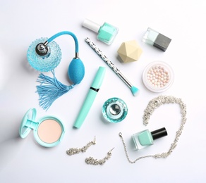 Photo of Composition with perfume bottles, cosmetics and accessories on white background, top view