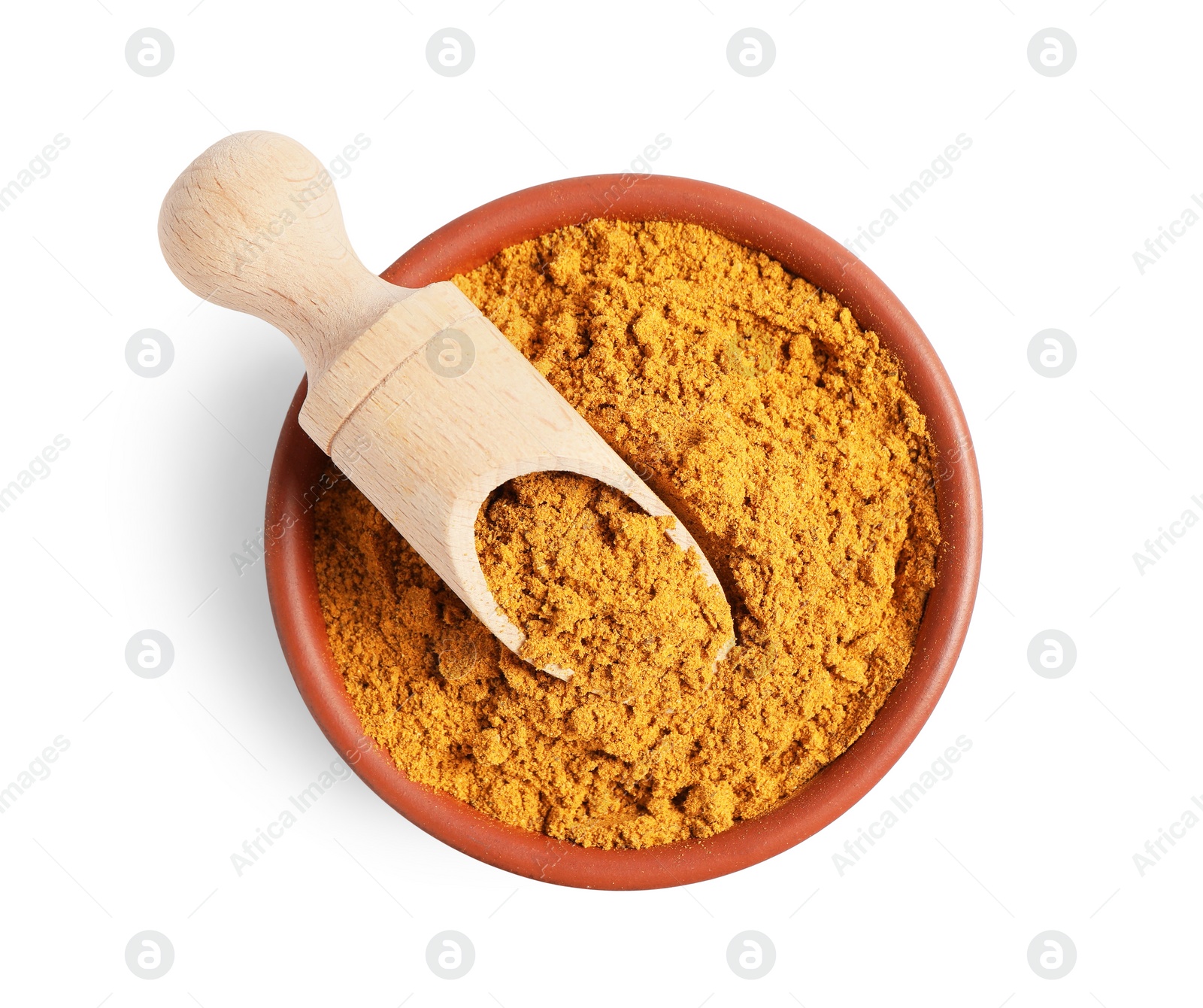 Photo of Curry powder in bowl and scoop isolated on white, top view