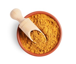 Photo of Curry powder in bowl and scoop isolated on white, top view