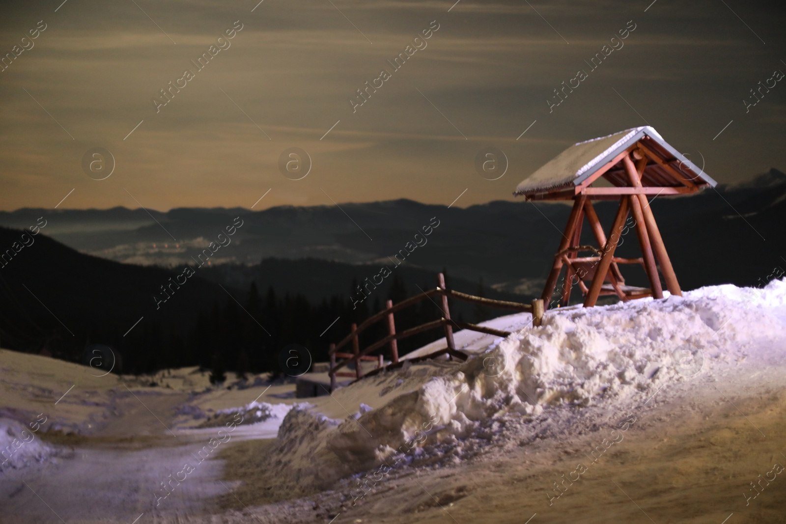 Photo of Beautiful view of snowy road at night