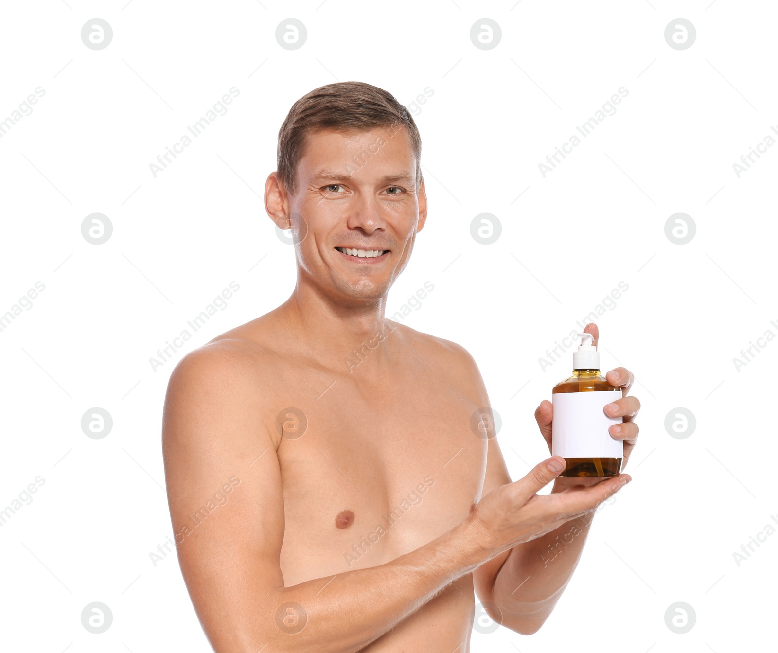 Photo of Portrait of man holding bottle with liquid soap on white background