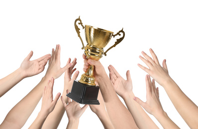 People with golden trophy cup on white background, closeup