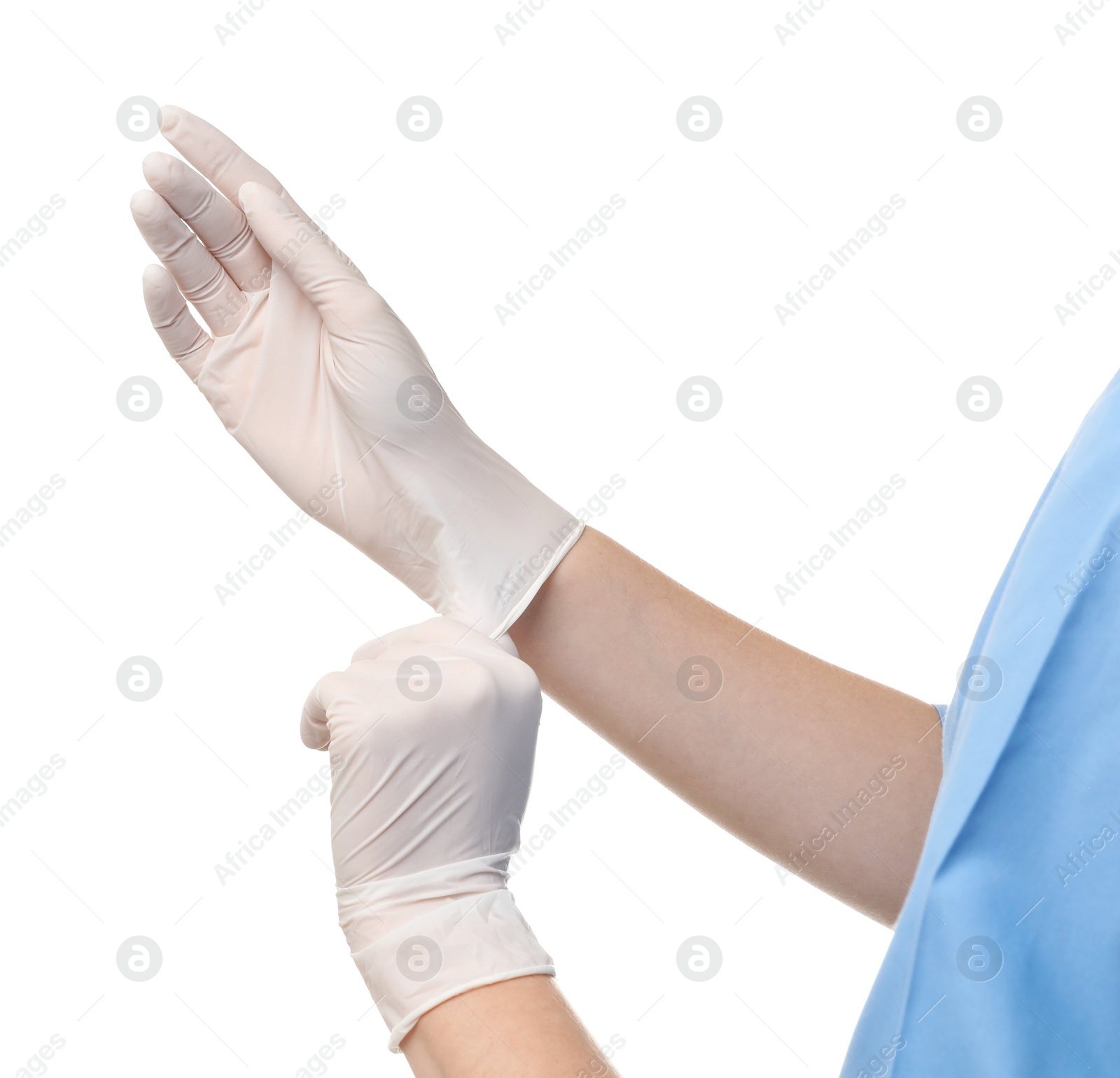 Photo of Female doctor putting on rubber gloves against white background, closeup. Medical object