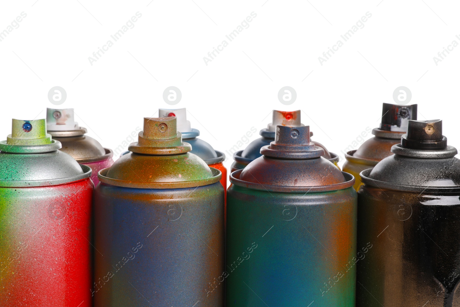 Photo of Used cans of spray paints on white background