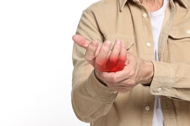 Man suffering from pain in wrist on white background, closeup