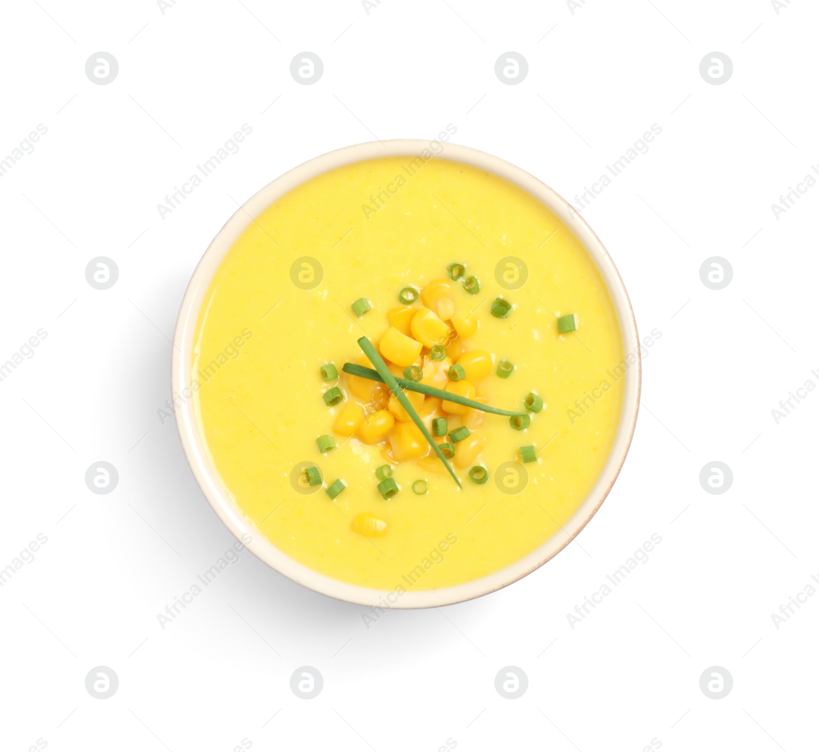 Photo of Delicious creamy corn soup isolated on white, top view