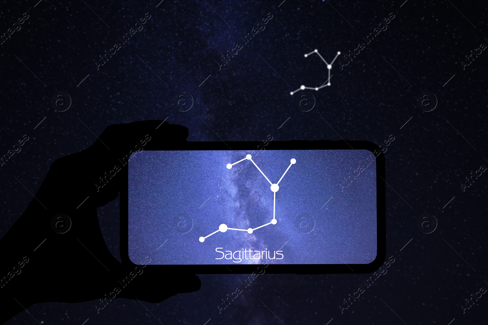 Image of Man using stargazing app on his phone at night, closeup. Identified stick figure pattern of Sagittarius (Archer) constellation on device screen