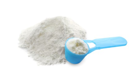 Photo of Powdered infant formula and scoop  on white background. Baby milk