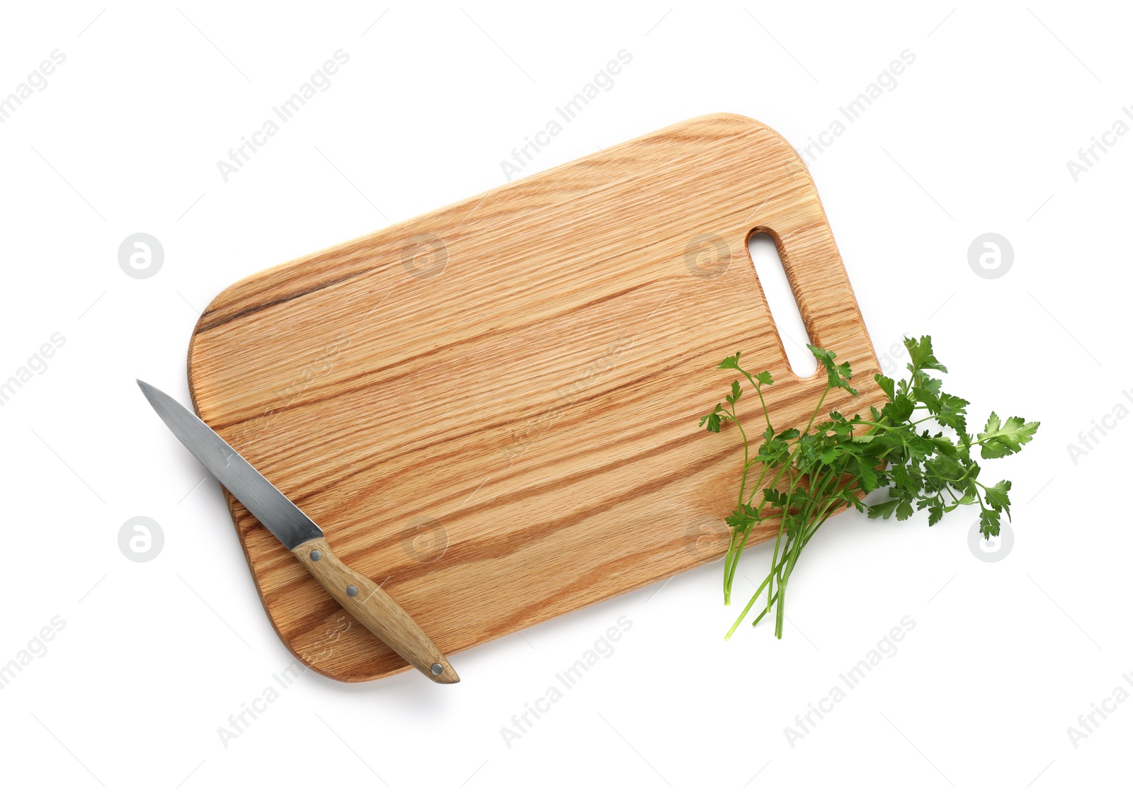 Photo of Wooden cutting board with parsley and knife isolated on white, top view